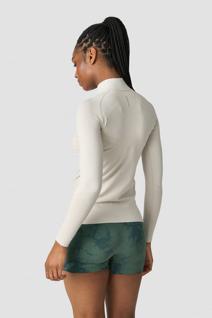 everyday seamless 1/4 zip wmn greige