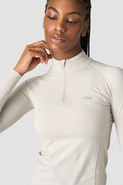 everyday seamless 1/4 zip wmn greige