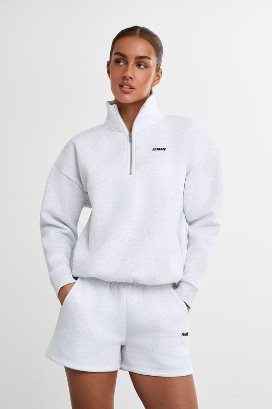 Puolivetoketjullinen neulepusero